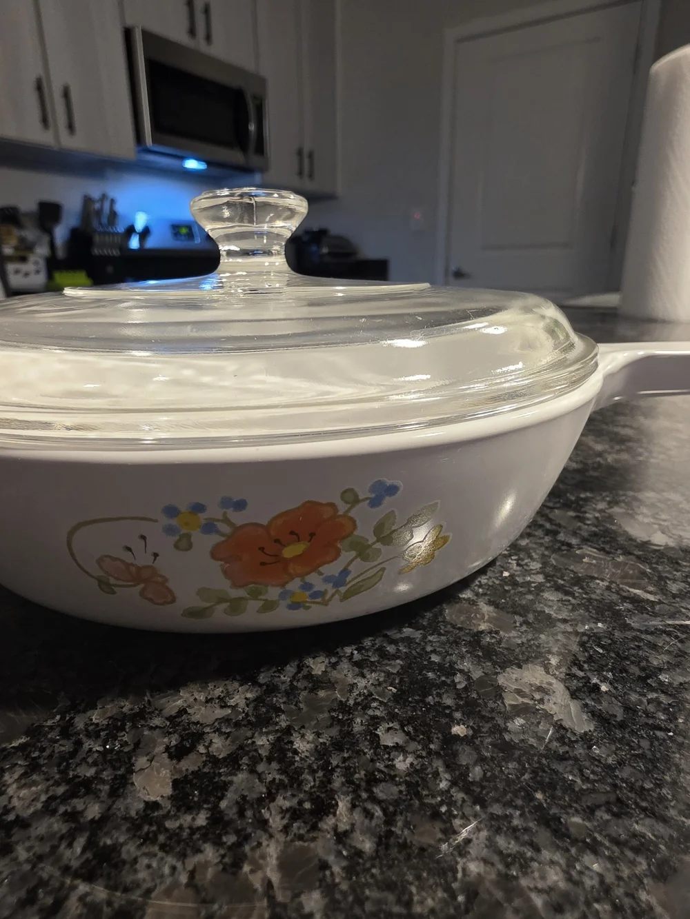 The Corning Ware Wildflower Saucepan/Skillet with Pyrex Lids.